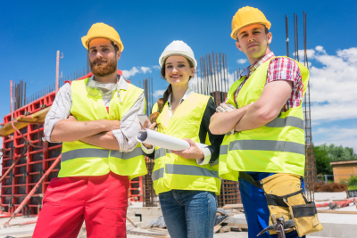 three young employees smiling